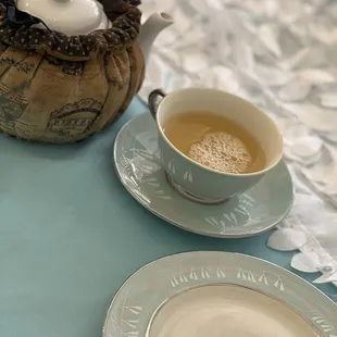 a teapot and a cup of tea