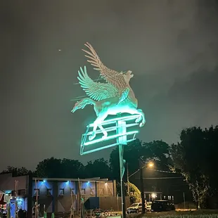 a neon sign for a restaurant