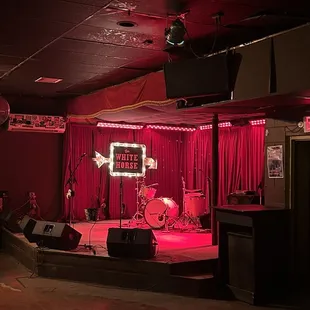a stage with red lighting
