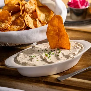 Rustic Chip Dip -
house-made, sour cream, onion, herbs, chips