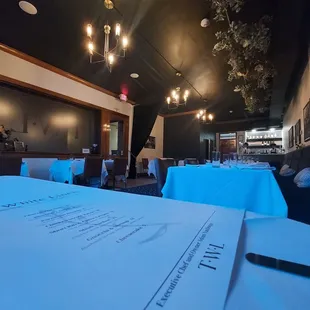 a restaurant with tables and chairs