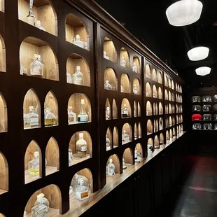 a wall of glass bottles