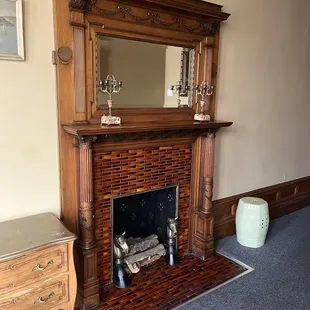 Fireplace inside the Men&apos;s Bathroom on the 2nd floor