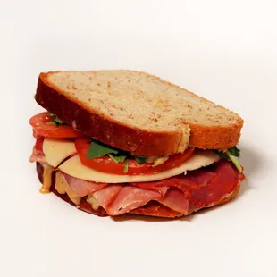 Christy: Capicola, Black Forest Ham, Provolone, Tomato, Arugula, Balsamic Aioli