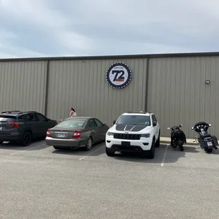 several cars parked in a parking lot