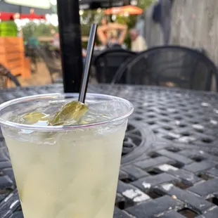 Pickle Juice Mocktail with pickle spears as garnish. Not a menu item, they DIY'd this for pregnant me. Similar to a pickle margarita!