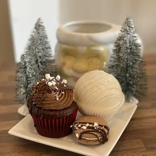 a chocolate cupcake and a cookie