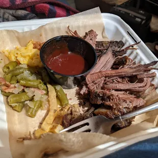 Delicious brisket with a bunch of sides
