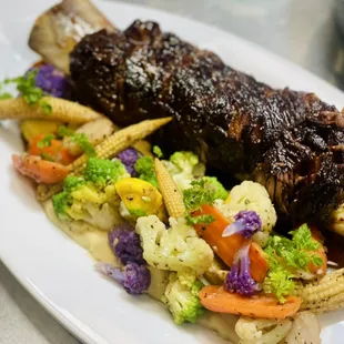 4 hours Cold smoke then sous vide for 48 hours. Our signature "bone in short rib"