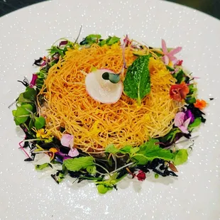 Tuna Tartare w/ house pickle, fried caper, phyllo dough, tapioca chips