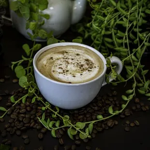 Delicious latte topped with a sprinkle of cinnamon!