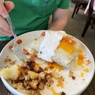 The breakfast burrito is large and the homemade breakfast potatoes are amazing!