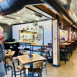 a man standing in a restaurant