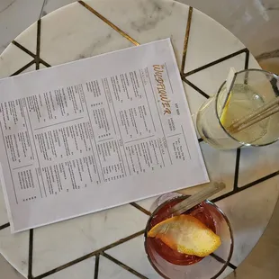 a menu on a marble table