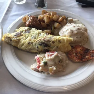 Omelette biscuits and gravy and potatoes yum yum