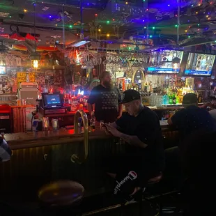 people sitting at the bar