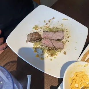 This is the filet that was supposed to be medium rare. You can also see a bit of the Mac and cheese as well.