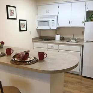 One bedroom apartment kitchen and breakfast bar