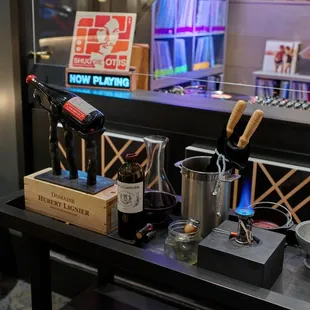 Sommeliers use using port tongs to open special bottles