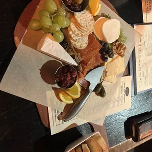 Charcuterie board - pepperoni, cheddar, Brie, mozzarella, ghost Jack cheese, cranberry conserve