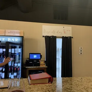a man standing in front of a vending machine