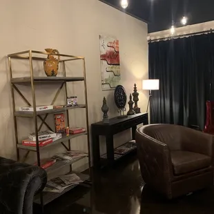 a living room with leather furniture