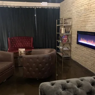 two chairs and a fireplace
