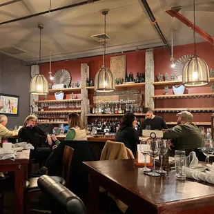 people sitting at a bar