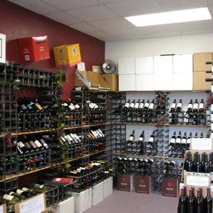 a wine rack with many bottles of wine