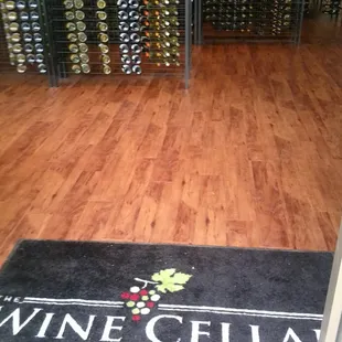 a wine rack with bottles of wine