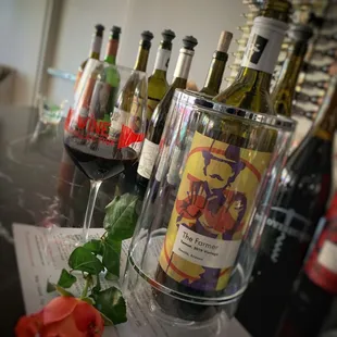 bottles of wine and a rose