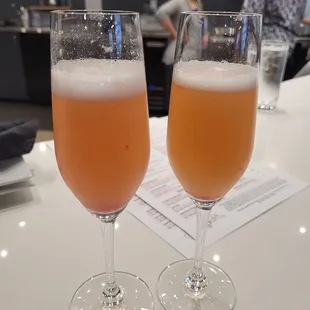 Peach raspberry mimosas