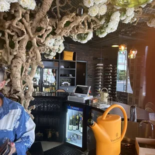 a man standing at a bar