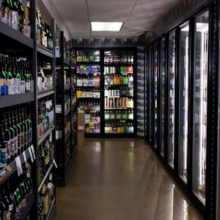 the aisle of a liquor store