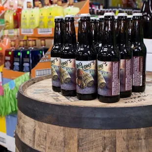 bottles of beer on a barrel