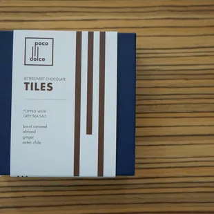 The wine house is 1 of 4 places that carries Poco Dolce chocolates. Grey sea salt bittersweet chocolate tiles - $15