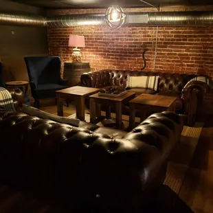 The loft. Super comfortable furniture and a low light ambiance.