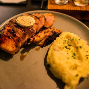 Dry-aged pork chop with mashed potatoes