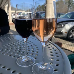 two glasses of wine on a table