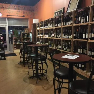 rows of bottles of wine on shelves