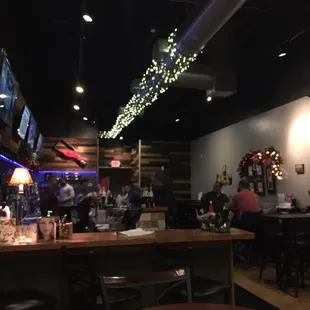 people sitting at the bar