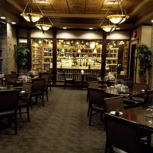 a wine cellar in the background