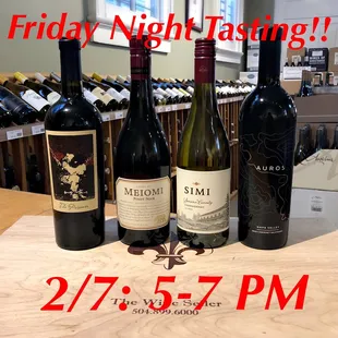 three bottles of wine on a table