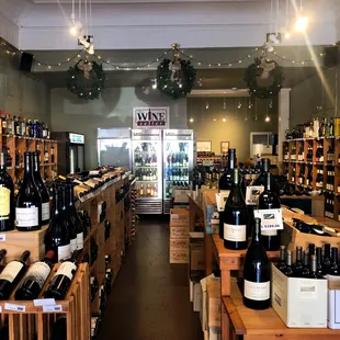 rows of bottles of wine in a store