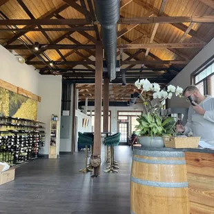 a man working at a wine store