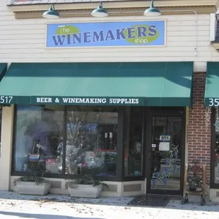 a woman walking in front of the store