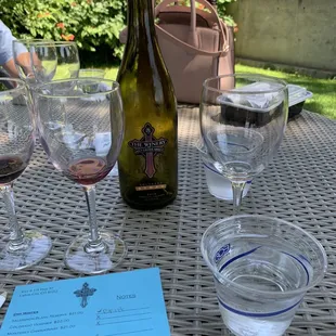 a bottle of wine and glasses