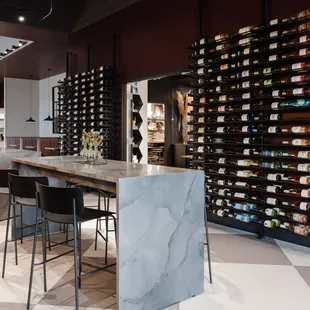 a wine rack with wine bottles on it