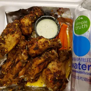 Spicy ranch wings, fried mushrooms, and extra carrots and celery, $26 with extra Doordash pickup fees. 2 meals easily