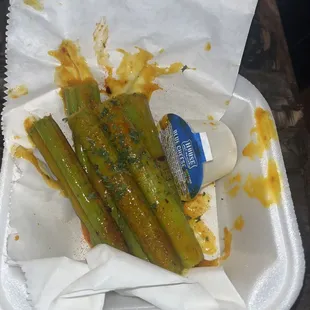 Celery tossed In "Triple J" sauce.